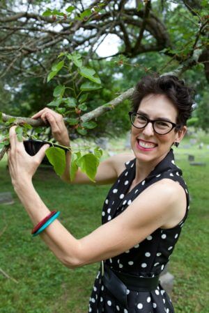 Sara Bir holding mulberries